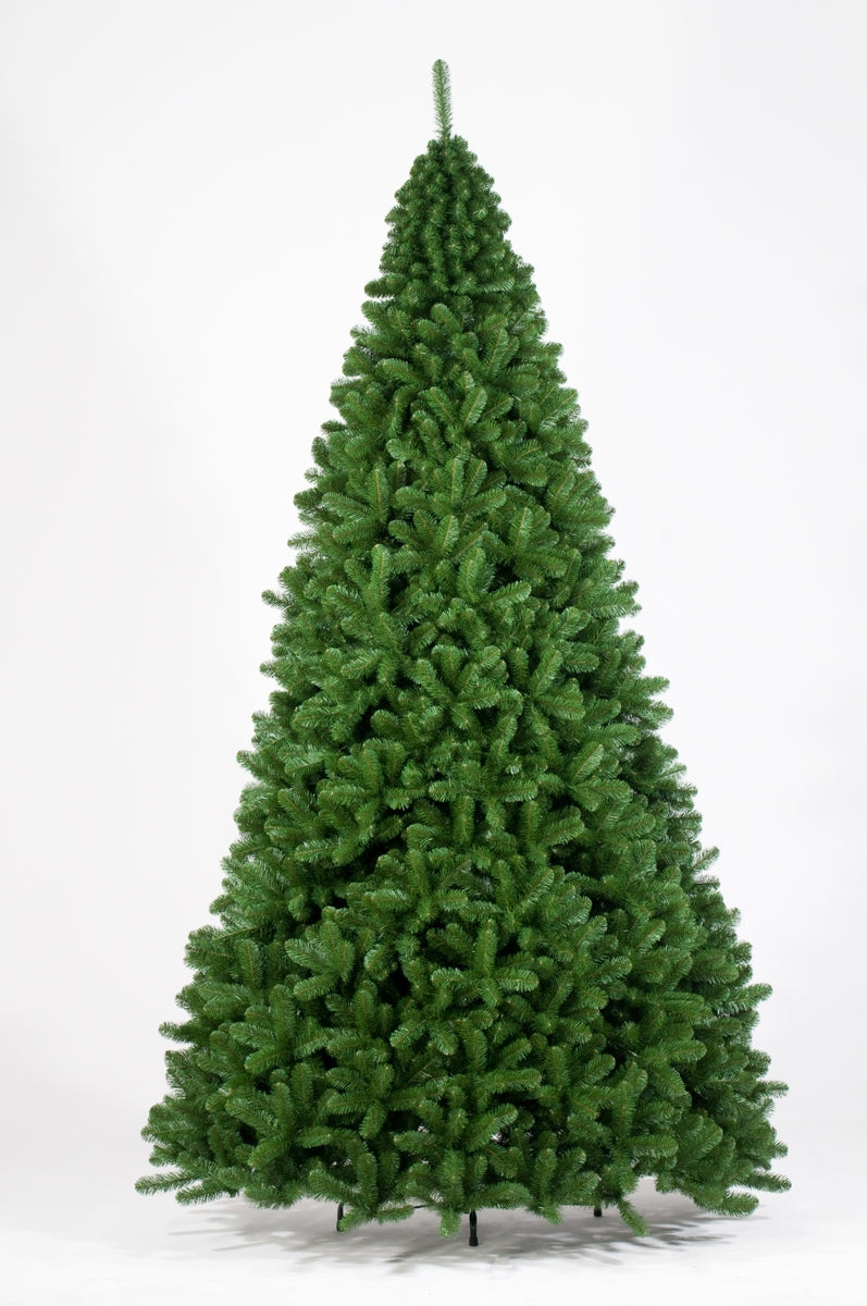 Green artificial Christmas tree on a white background